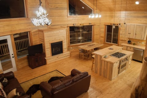 Living room and kitchen viewed from the open loft
