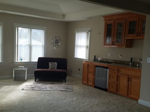 Sitting room in master suite, with granite countertop & frig-relax upstairs