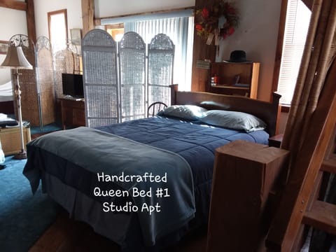 Enter deck via sliding glass doors. Two queen beds are to left & right of entry.