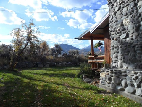 Side Yard with corner of Front Deck and Cinnabar Mountain