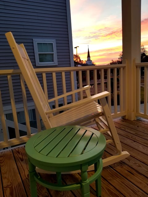 Beautiful sunrise views from front porch with 2 rocking chairs.  