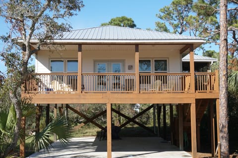 Exterior with ample under the house parking 