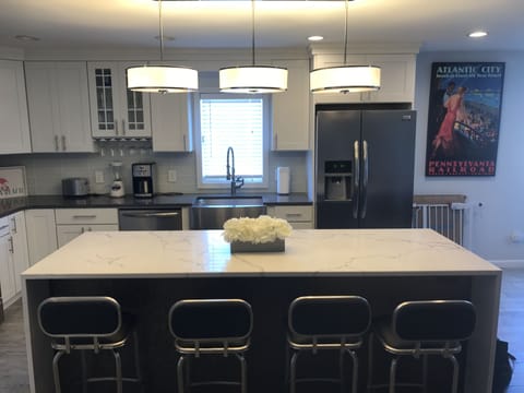 All new kitchen with quartz and stainless appliances.