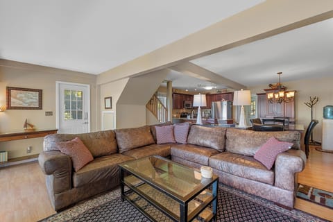 Oversized leather sectional is 10ft x 10 ft.