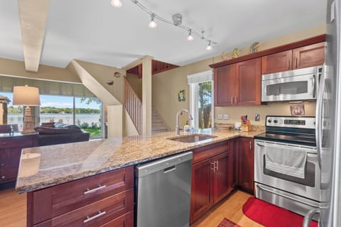 You can watch the boats go by from the kitchen.