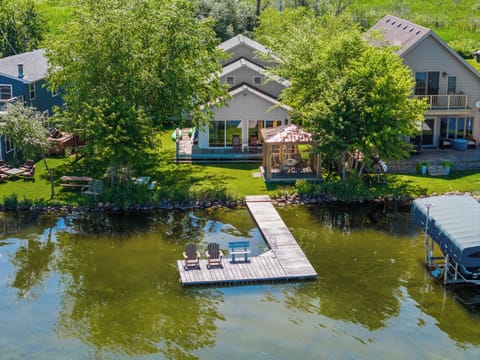 "The Island Lake House" on beautiful Lake Ripley - featuring a new screen house.