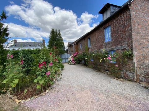 The Coach House - The Priory visible in the background 