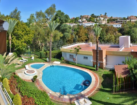 Our Penthouse on the left side with the swimming pool behind