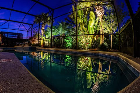 Beautiful pool area with the only landscape lighting in Windsor Palms