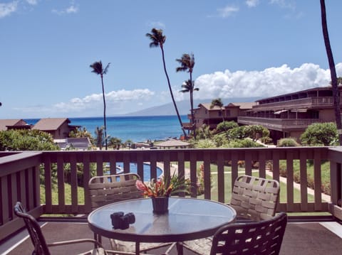 A beautiful view of Keoni Nu'i bay and  Moloka'i while you enjoy your
 coffee.