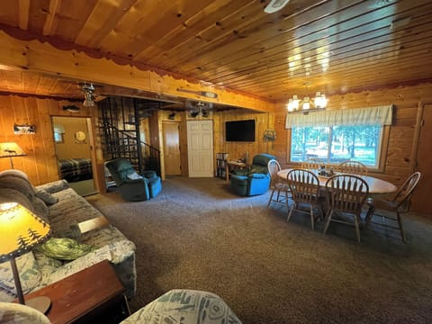 Living/Dinning Room with doors to 1st floor bedrooms.