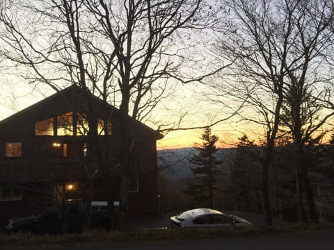 View of the house at sunset from West Ridge Road.