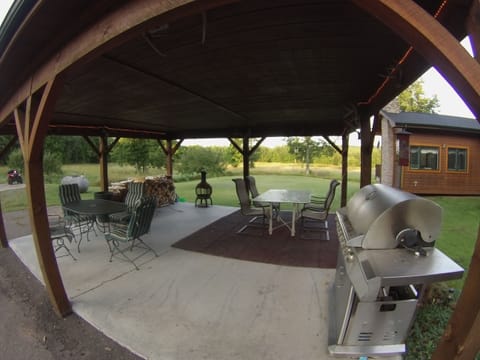 pavilion with grilling area a few steps from house