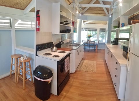 Kitchen with dinning areas on either side.  