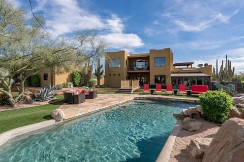 [Resort Property] Heated Saltwater pool with state-of-the-art Pebble Tec and waterfalls, with plenty of lounging