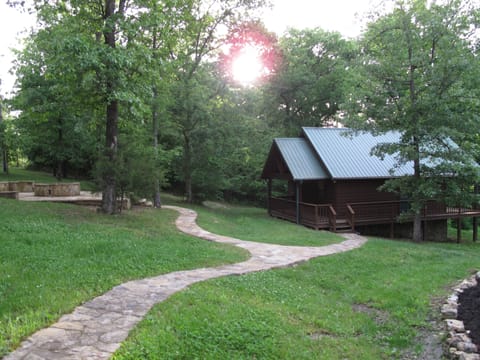 Rental Cabin and fire pit with a grill and smoker