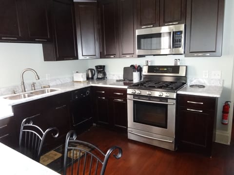 Kitchen with updated stainless steel appliances and dishwasher!