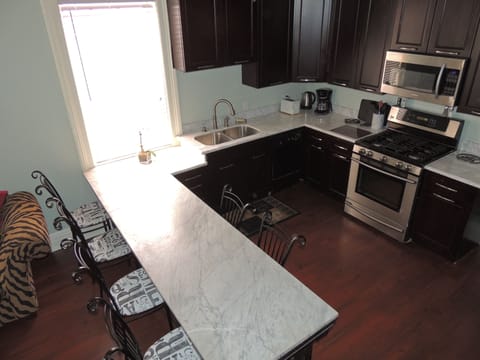 Birdseye view of marble top reclaimed soda bar - now our dining area and kitchen