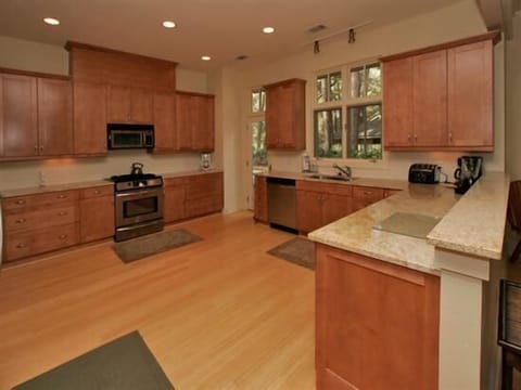 Fully Stocked Large Kitchen with plenty of cabinets and granite countertops