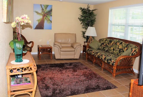 Living room with rattan and lazy boy