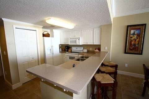 Roomy kitchen in the open floorplan. keurig machine and Cuisinart, griddle,