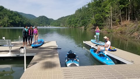 2 paddle boards, 2 kayaks and 3 person canoe. assorted life vests provided.