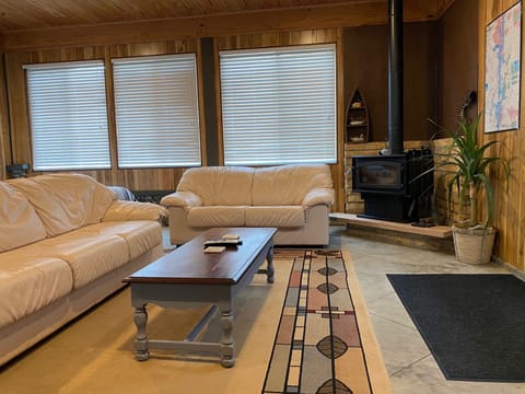 Second bedroom with seating and 48" HDTV