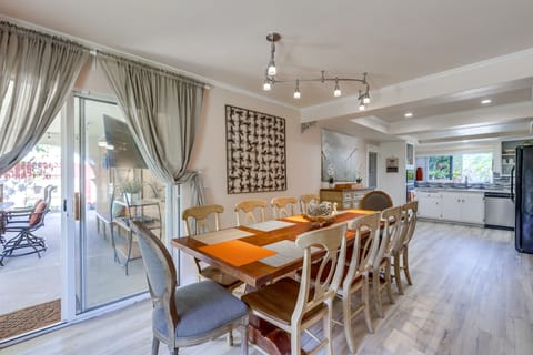 Natural Slab dinning room table seats 10 comfortably, add another 8 to the porch