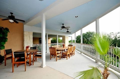 Back patio overlooking the Guadalupe River. Perfect place to relax with friends