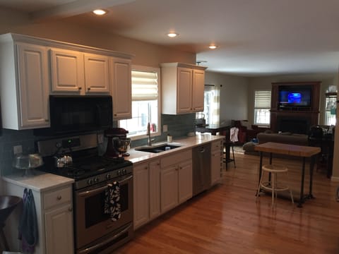 Updated kitchen/TV room view from dining room