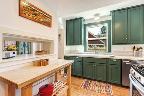 Light filled kitchen with everything needed for prepping a meal