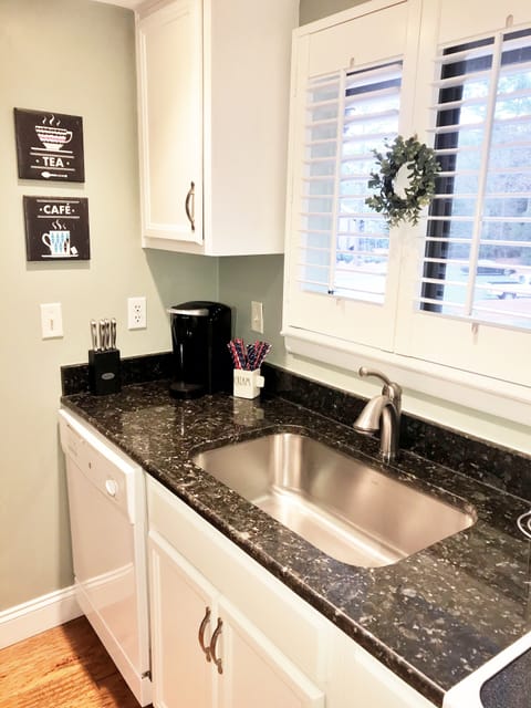 Keurig coffee maker, selection of K-cups,teas, sugar, creamer, reg. coffee-maker