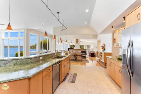 Panoramic water views from the kitchen and all living areas