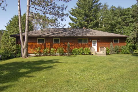 Large parking area with room for kids to play in the yard