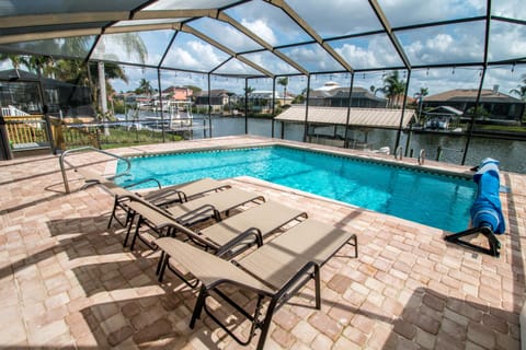 Sit Back and relax by the heated pool