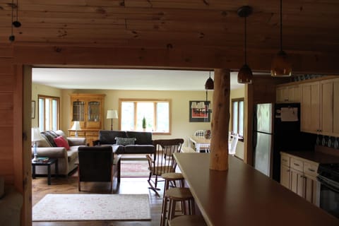 Looking from sitting area into family room