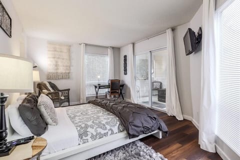 Bedroom #1  
Queen Bed
Private Balcony, 
TV with local channels and Netflix.