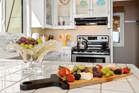 Snack time is easy in this fully stocked kitchen.