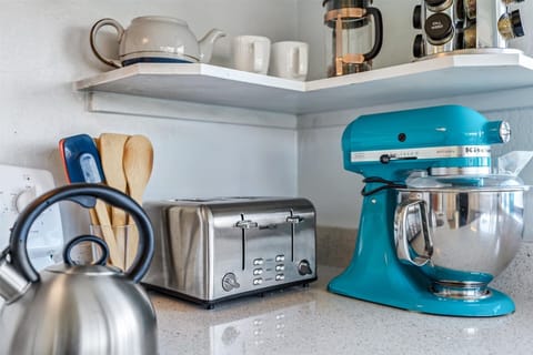 Fully stocked kitchen with all the needed appliances