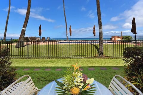 Out door lanai with view of pool and ocean beyond!