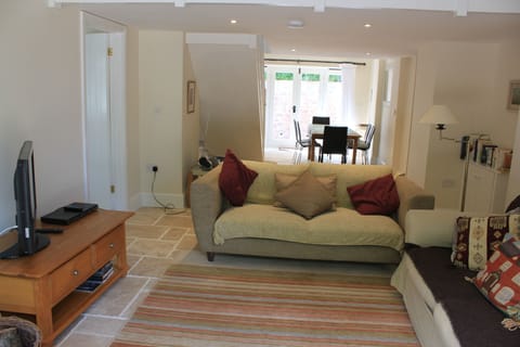 Field Barn living room - dining area behind