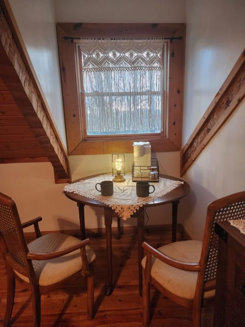 Cozy, romantic, private sitting area in master suite. 
