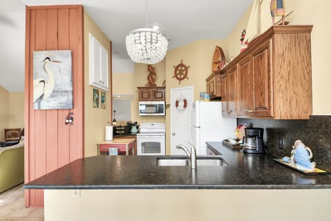 Kitchen view with granite countertops