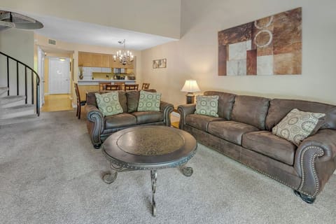 large living area with sprial staircase to upstairs bedroom
