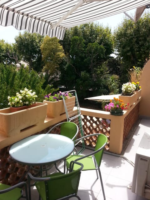 A table and chairs to take there your breakfast