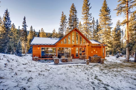 Back of house and backyard. Backs up to National Forest. Slight mountain views.