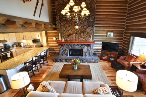 2nd Floor: Living Room with fireplace, HDTV/DVD, large deck