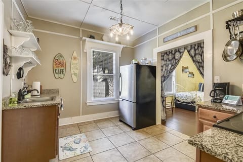 And now into this fabulous kitchen! We've already seen so many great spaces in this home... how will you choose where to be?
