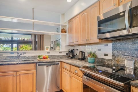 Enjoy cooking your favorite meal in your fully furnished kitchen with stainless steel appliances