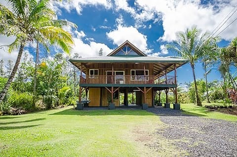 Ohia log cabin home
